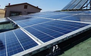 Mustafa Elitaş evinin çatısında elektrik üretmeye başladı